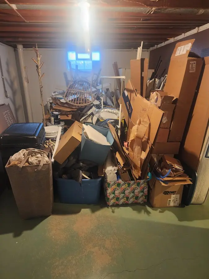 Roll-off dumpster container at job site for 4 Yard Dumpster Rental in Miami Springs